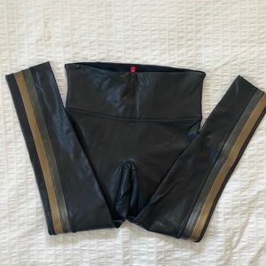SPANX Faux Leather leggings with bronze and silver stripe. Size Med